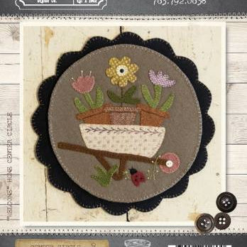 Photo of Buttermilk Basin Pattern in Center Circle Woolen Mats - May - Wool Applique
