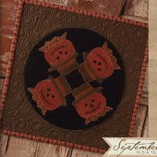 Photo of Candle Mats in Wool Applique Pattern from Half Pints Buttermilk Basin