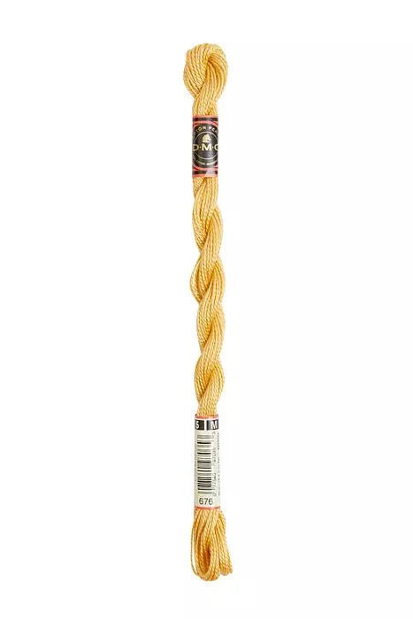 Photo of DMC - Pearl Cotton 100% Cotton in Color 676 - Savanna - 
Size 5 thread - 27yds per skein