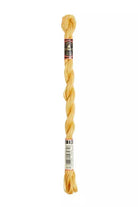 Photo of DMC - Pearl Cotton 100% Cotton in Color 676 - Savanna - 
Size 5 thread - 27yds per skein