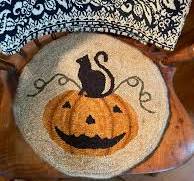 Photo of Jack-O-Lantern Chair Pad in Rug Hooking from The Blue Tulip