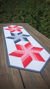 Photo of Twirl-N-Spin Table Runner Pattern from Cut Loose Press